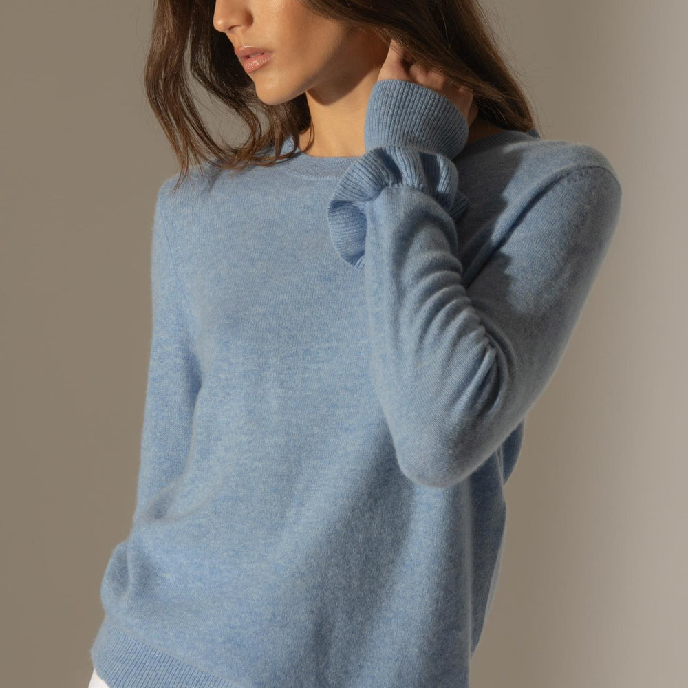 LUING pull col rond volants poignets sky 100% cachemire